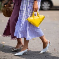 Funda Christophersen, Trine Kjaer wearing yellow Balenciaga triangle bag seen outside Holzweiler during the Copenhagen Fashion Week Spring/Summer...