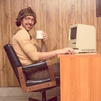 funny 1980s computer man at desk with coffee - home decoration stock pictures, royalty-free photos & images