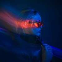 futuristic woman in neon lights with sunglasses - fashion stock pictures, royalty-free photos & images
