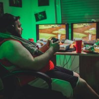 gamer playing video games - junk food stock pictures, royalty-free photos & images