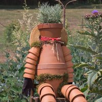 garden decoration sitting clay pot man - garden decoration stock pictures, royalty-free photos & images