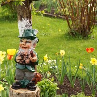 garden gnome in garden - garden decoration stock pictures, royalty-free photos & images