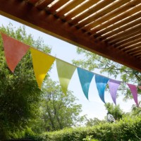 garden party under pennant flag - garden decoration stock pictures, royalty-free photos & images