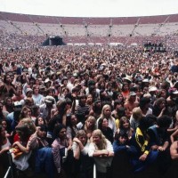General view of fans standing at the front of the stage at the Los Angeles Memorial Coliseum for a 1979 Los Angeles, California, concert by Eddie...