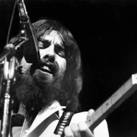 George Harrison performs onstage at the Concert for Bangladesh which was held at Madison Square Garden on August 1, 1971 in New York City, New York.