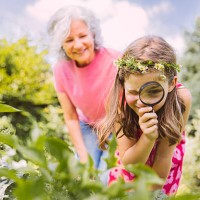 germany, northrhine westphalia, bornheim, grandmother and granddaughter working in vegetable garden - garden decoration stock pictures, royalty-free photos & images