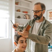 getting haircut done at home - hairstyle stock pictures, royalty-free photos & images