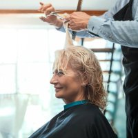 getting her hair cut by professional - hairstyle stock pictures, royalty-free photos & images