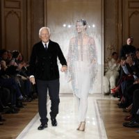 Giorgio Armani acknowledges the applause of the audience during the Giorgio Armani Privé Haute Couture Spring-Summer 2025 show as part of Paris...