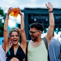 girl dancing with beer in hands - concert stock pictures, royalty-free photos & images