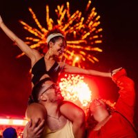 girl on boyfriends shoulders dancing at festival - concert stock pictures, royalty-free photos & images