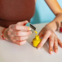 girl painting her nails at home with nail polish - nails art stock pictures, royalty-free photos & images