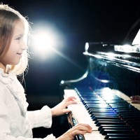 girl playing the piano. - concert stock pictures, royalty-free photos & images
