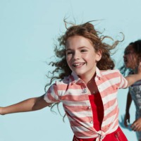 girl running with arms out, on studio background - fashion stock pictures, royalty-free photos & images