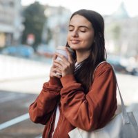 girl smells coffee - junk food stock pictures, royalty-free photos & images