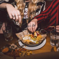 girlfriends on a night out - food stock pictures, royalty-free photos & images