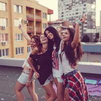 girls partying on the rooftop - garden decoration stock pictures, royalty-free photos & images