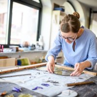 glass artist craftswoman working in her studio - nails art stock pictures, royalty-free photos & images