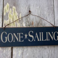 gone sailing sign hanging on side of house - home decoration stock pictures, royalty-free photos & images