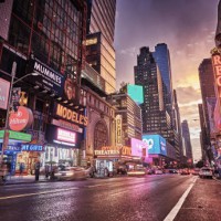 grand shine of 42nd street. new york. classical view of times square. illuminated advertisement billboards. dramatic sunset. - fashion stock pictures, royalty-free photos & images