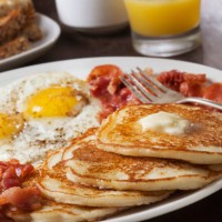 grand slam breakfast with pancakes, bacon, eggs, and toast - food stock pictures, royalty-free photos & images