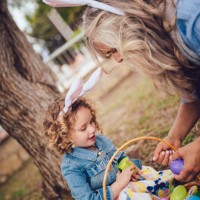 grandmother and granddaughter with easter eggs basket in garden - garden decoration stock pictures, royalty-free photos & images