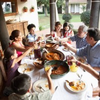 grandparents, parents and children (7-15) toasting at dinner - food stock pictures, royalty-free photos & images