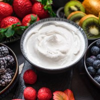greek yogurt in a glass jars with spoons,healthy breakfast with fresh greek yogurt, muesli and berries on background. - food stock pictures, royalty-free photos & images