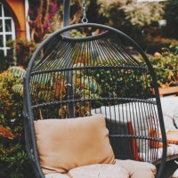 green metal garden furniture in a small garden. - garden decoration stock pictures, royalty-free photos & images