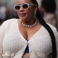 Greivy seen wearing KREWE brown / white checked sunglasses, Jenny Cipoletti pearl necklace, gold pearl earrings, Generation Love wool knit / crochet...