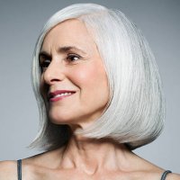 grey haired woman in 3/4 postion, portrait. - hairstyle stock pictures, royalty-free photos & images