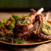 grilled new zealand lamb chops plated with sauteed brussel sprouts - food stock pictures, royalty-free photos & images