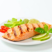grilled salmon steak on a plate - food stock pictures, royalty-free photos & images