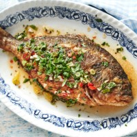 grilled sea beam with mojo isleno puerto rican sauce - food stock pictures, royalty-free photos & images