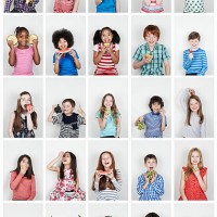 group of children eating fruit - food stock pictures, royalty-free photos & images