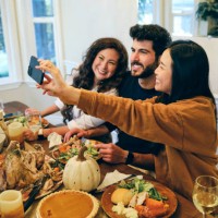 group of friends celebrating thanksgiving - home decoration stock pictures, royalty-free photos & images