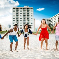 group of friends jumping on the beach - concert stock pictures, royalty-free photos & images