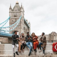 group of friends on vacation texting on mobile - travel stock pictures, royalty-free photos & images