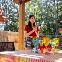 group of friends singing happy birthday at a party - garden decoration stock pictures, royalty-free photos & images