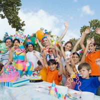 group of people celebrating a birthday party - garden decoration stock pictures, royalty-free photos & images