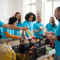 group of people working in charitable foundation - food stock pictures, royalty-free photos & images