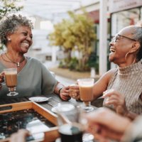 group of senior friends at coffee shop - coffee stock pictures, royalty-free photos & images
