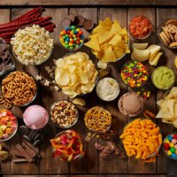 group of sweet and salty snacks, perfect for binge watching - junk food stock pictures, royalty-free photos & images