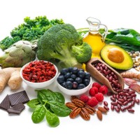 group of vegan food rich in antioxidants on white background - food stock pictures, royalty-free photos & images