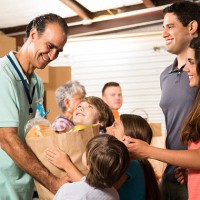 group of volunteers provide groceries donations to needy families. charity. - food stock pictures, royalty-free photos & images
