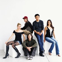 group of young adults sitting in studio, portrait - fashion stock pictures, royalty-free photos & images