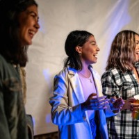 group of young friends dancing at a beach party - concert stock pictures, royalty-free photos & images