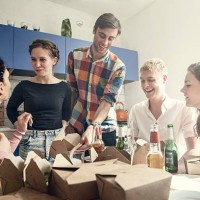 group of young people having a party - junk food stock pictures, royalty-free photos & images