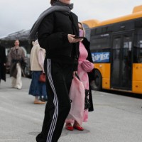 Guest is seen wearing a Black Blouson with a Pair of Adidas Track Pants outside Marimekko show during the Copenhagen Fashion Week Autumn/Winter 2025...