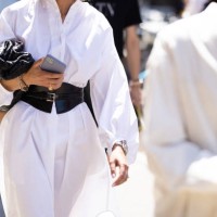 Guest is seen wearing a dress shirt with leather belt outside Valentino show during the Milan Fashion Week - Menswear Spring/Summer 2024 on June 16,...